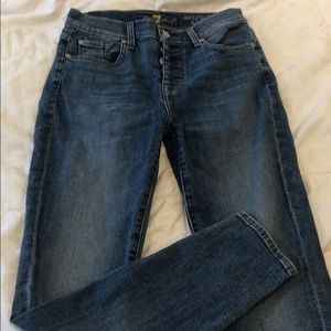 Button top mid wash skinny jeans